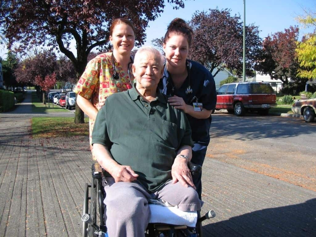 Live-in caregiver keeping a senior client company at home