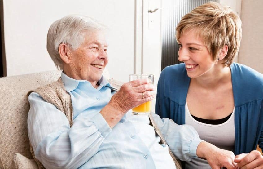 Caregiver supporting a client living with dementia